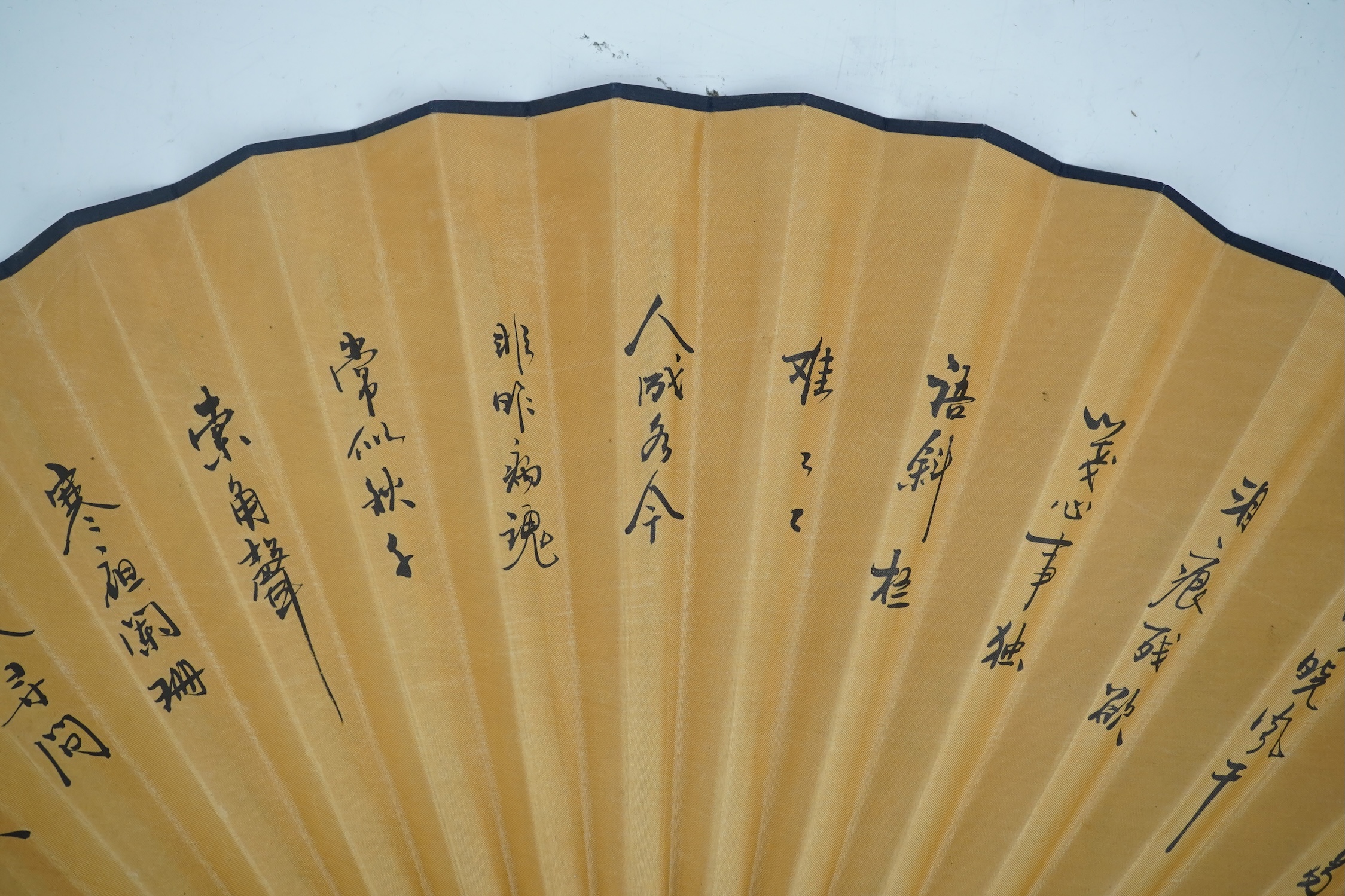 A fine Chinese sandalwood brise fan with finely carved sticks and guards, together with a mid 20th century silk calligraphic poetry LuYou fan, brise fan 38cm wide. Condition - minute damage to carving on one stick, sanda